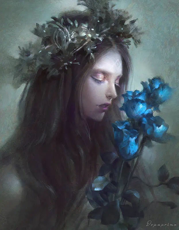 A young lady with a crown of greenery on her head leans down to smell some blue roses
